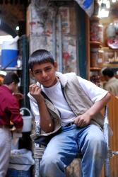 A young porter in Aleppo's souk
