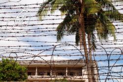 S21 or Tuol Sleng seen through barbed wire