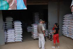 Buying rice for the orphanage
