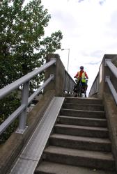 A stupid set of stairs at the end of a bike path