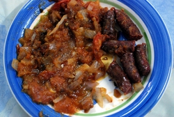 Our lunch: sausages, tomatoes and onions