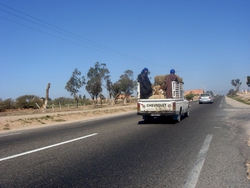 Crowed trucks on the way to Agadir